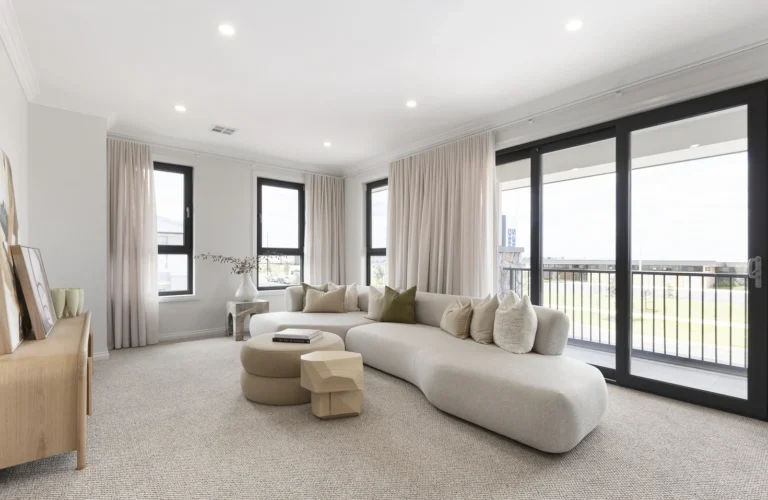 Modern living room with 3 windows and a large slide door with lots of natural light