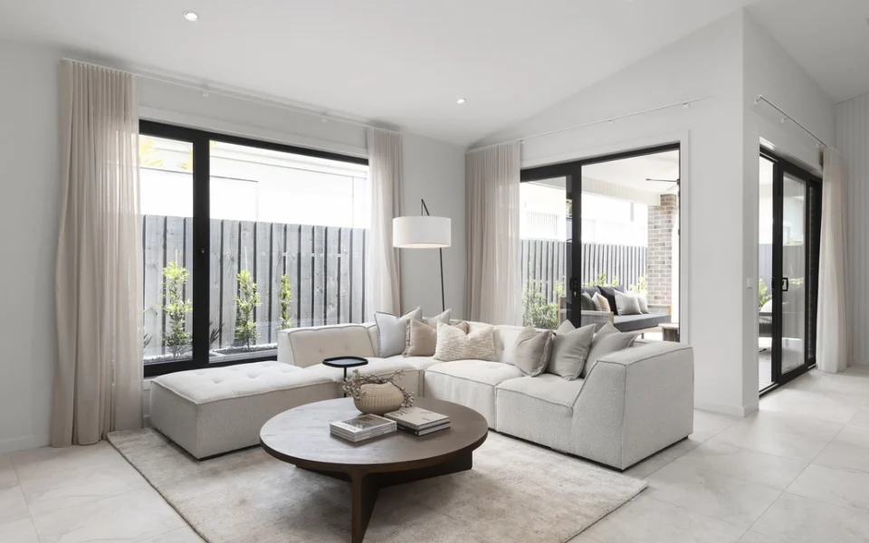 Bedroom with large windows letting in natural light