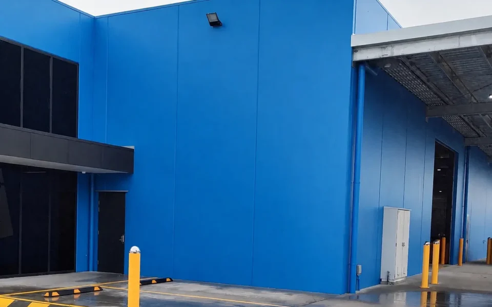 Perfect Windows and Doors blue factory building